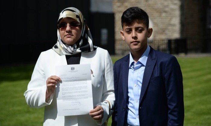 Fatima Boudchar e seu filho, Abderrahim Belhadj, 14